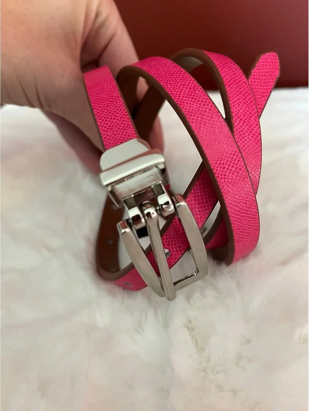 Express women’s size medium reversible pink and brown thin belt, silver har